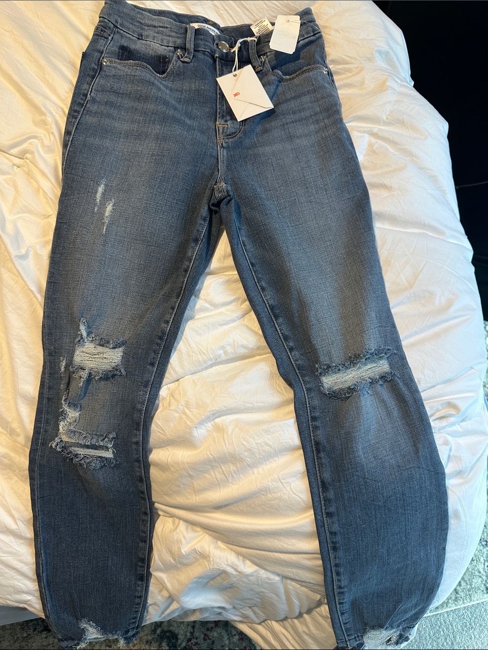 Good American Distressed Skinny Jeans in Medium Blue